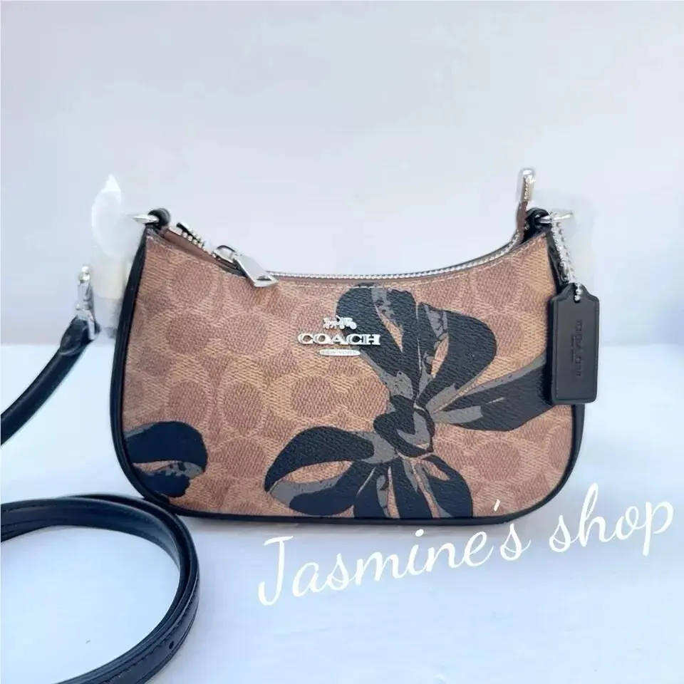 Teri Mini Crossbody Bag in Signature with Bow /lips /sticker Print Opt CY733/bow print/black multi by Coach