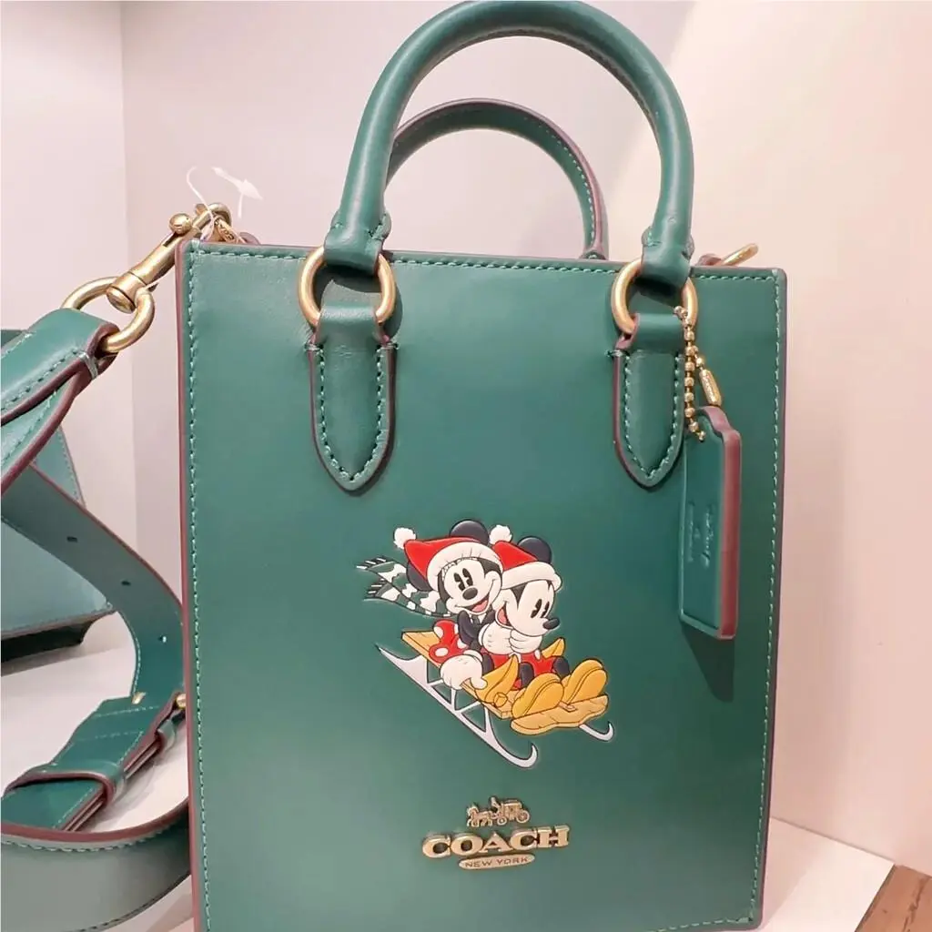 X Disney North South Mini Tote with Sled Motif/minnie Mouse/ice Skate CN021/Brass/Dark Pine by Coach