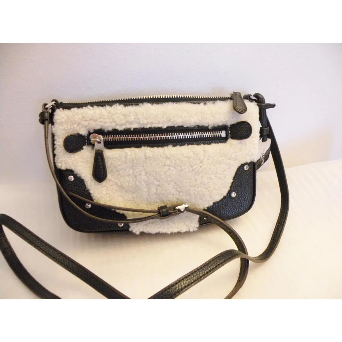 36490 Small Rhyder Pochette in Shearling Natural White Silver by Coach