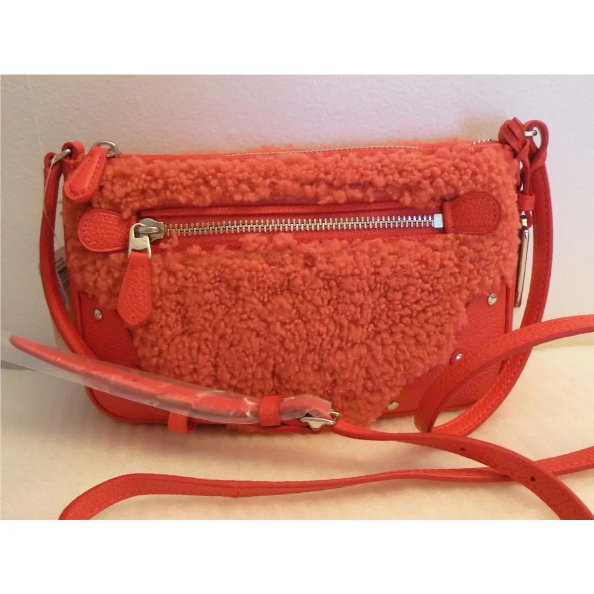 36490 Small Rhyder Pochette in Shearling Orange by Coach