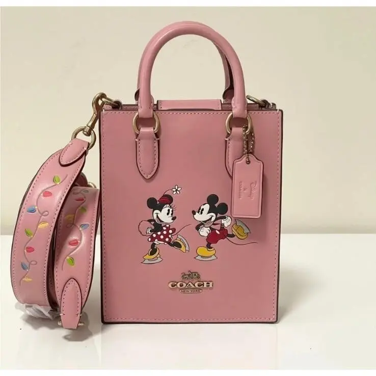 Coach CN023 Disney X Coach North South Mini Tote with Ice Skate Motif Blush