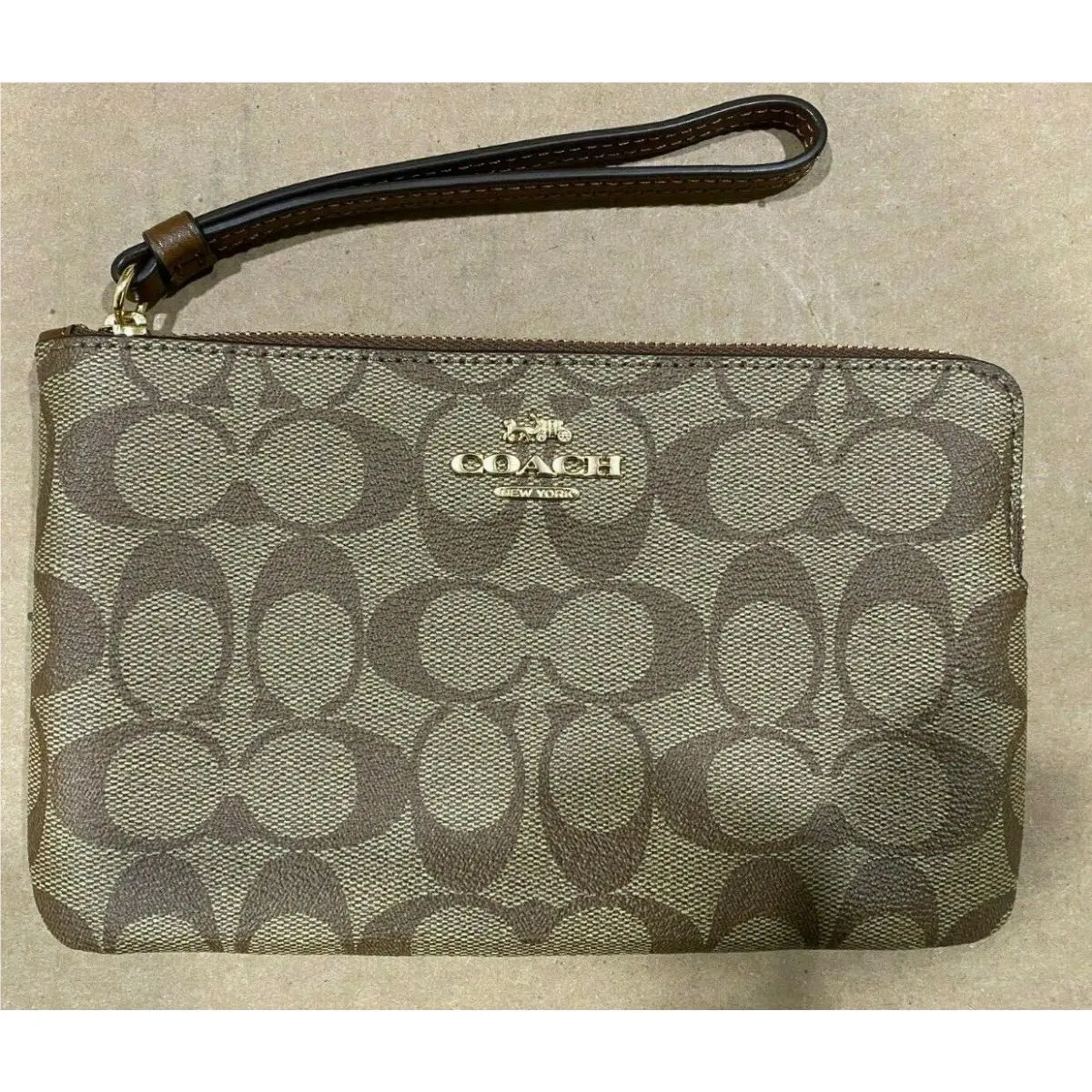 Large Corner Zip Wristlet In Signature Canvas 6648 Im/khaki Saddle by Coach