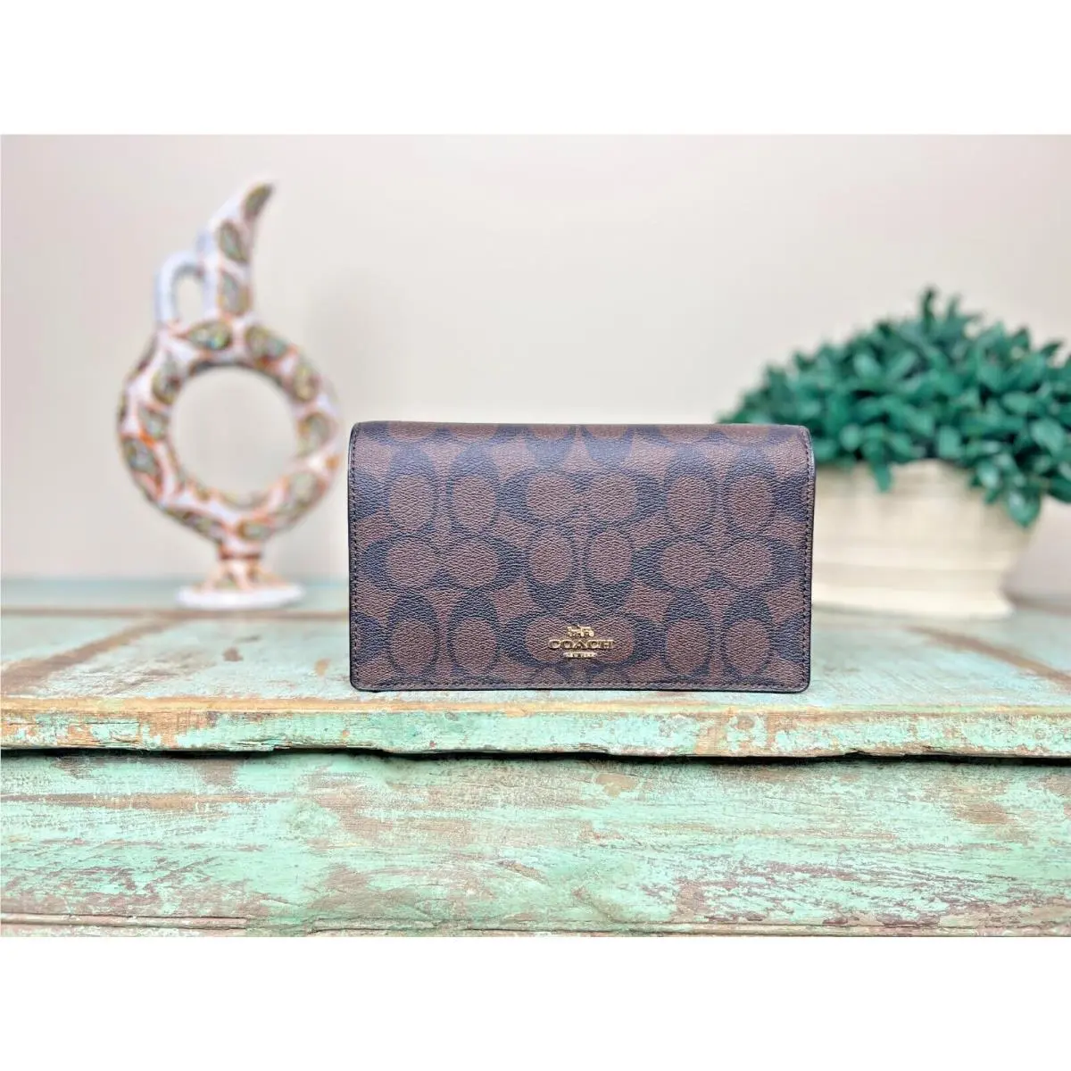 Coach Anna Foldover Crossbody Clutch in Signature Canvas in Brown/black 3036