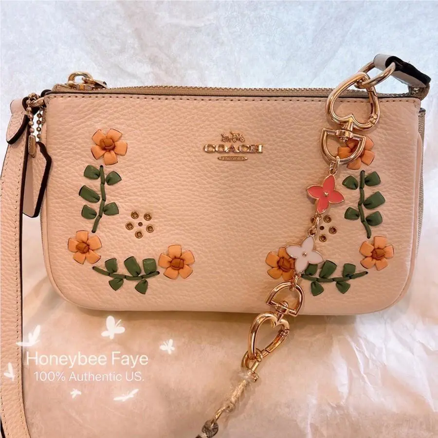 Coach Nolita 19 In Signature Canvas with Floral Whipstitch C9924