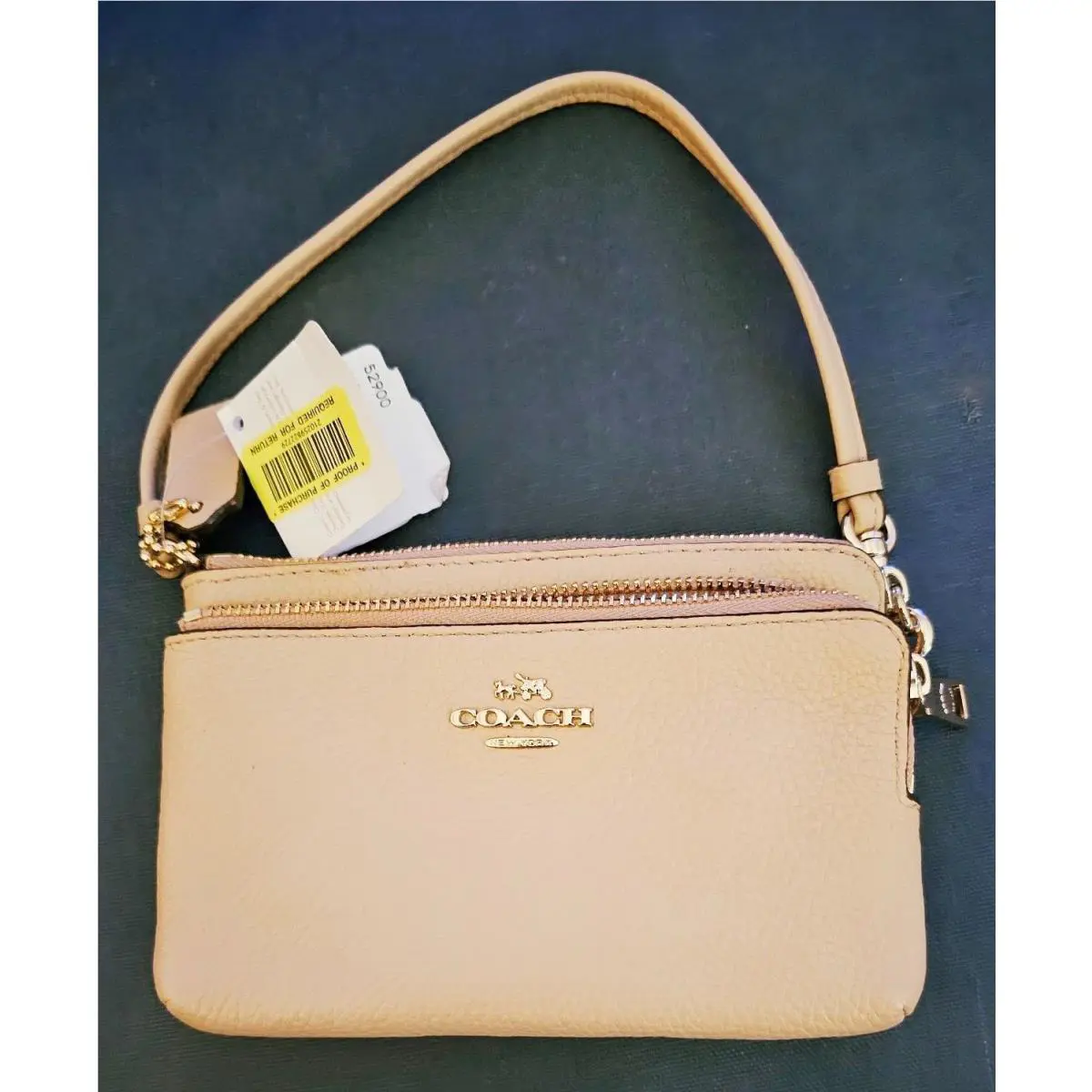 Very Nice 6 Coach Zippered Tan Wristlet