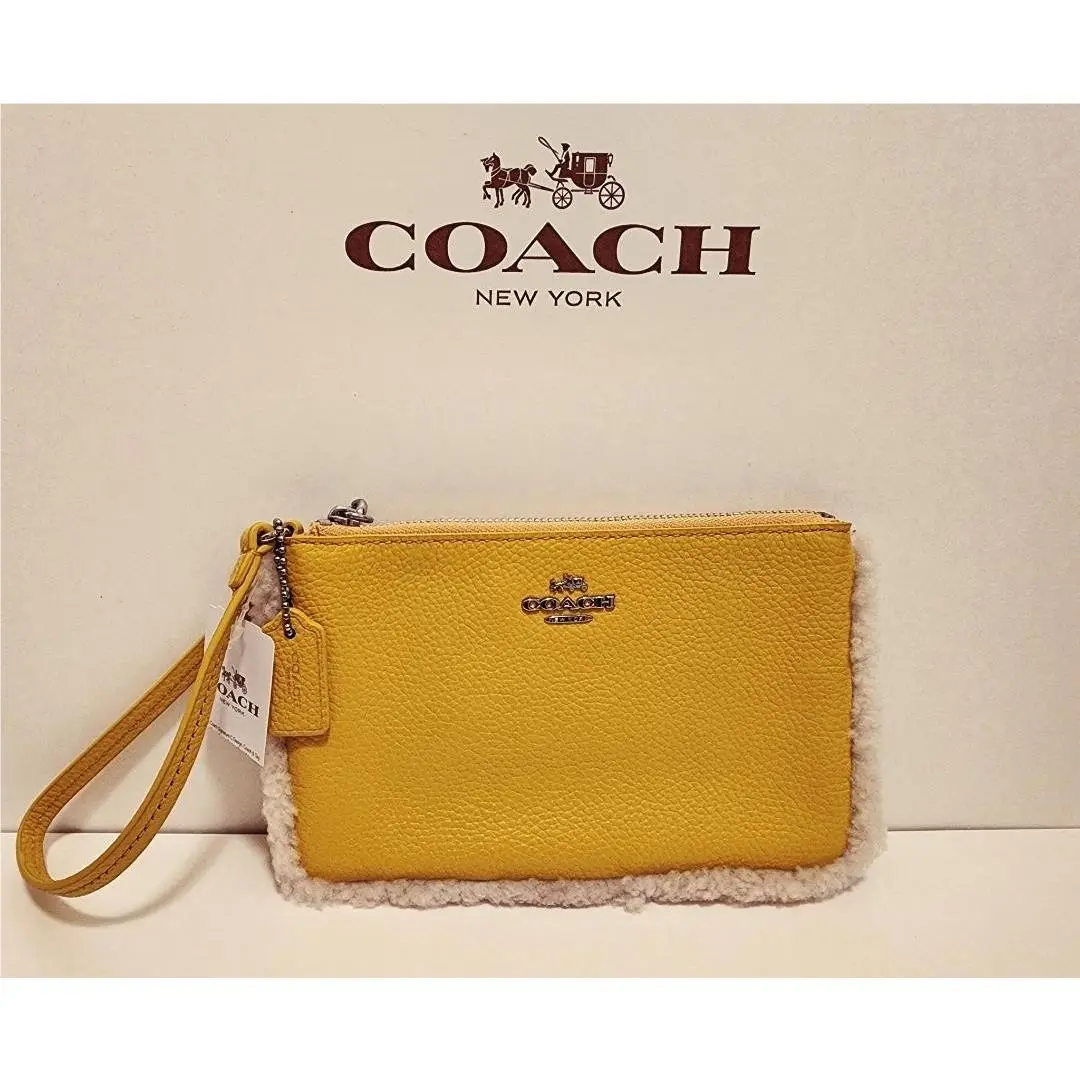 Coach Pebbled Leather Wristlet Shearling Trim in Banana Yellow - F64709