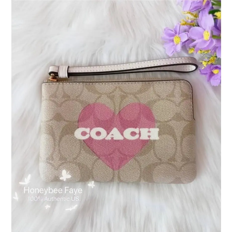 Coach Corner Zip Wristlet In Signature Canvas with Heart Print CP436