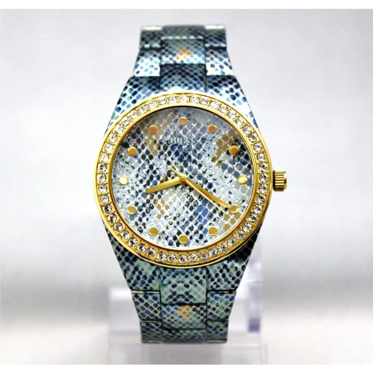 Guess U0583L1 Blue Python Printed Golden Crystal Bezel Dial Women Watch