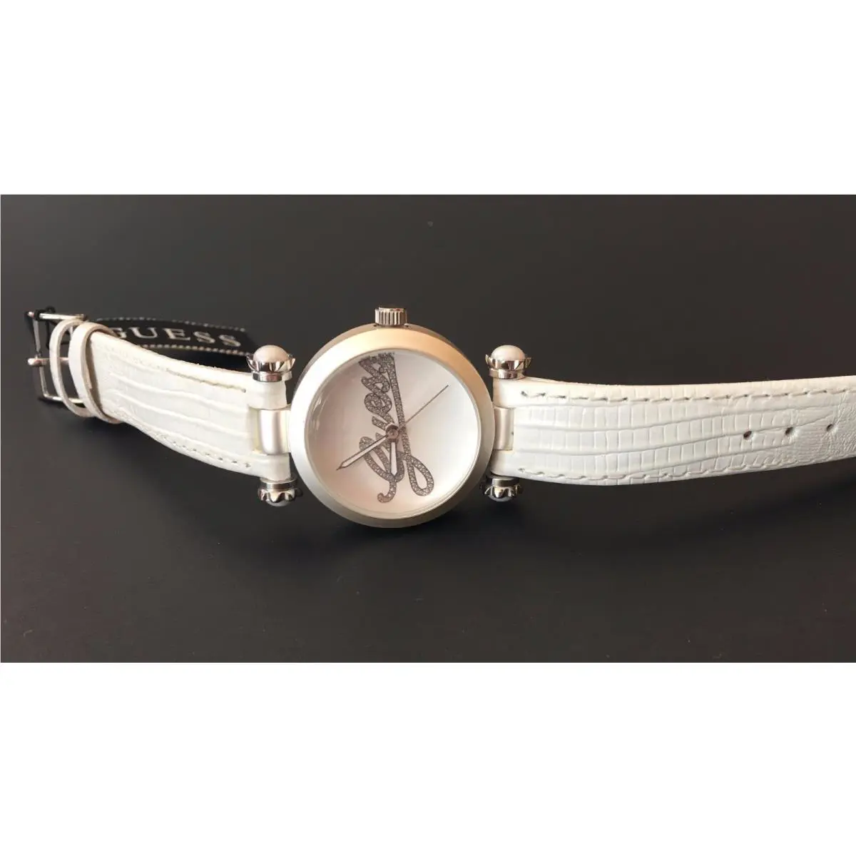Guess Pale Gold Tone White Leather Band Crystals Logo Watch W0057L3