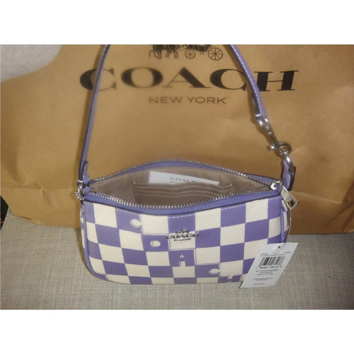 Coach Nolita 19 Checkerboard Prt Wristlet.$188.00.100%