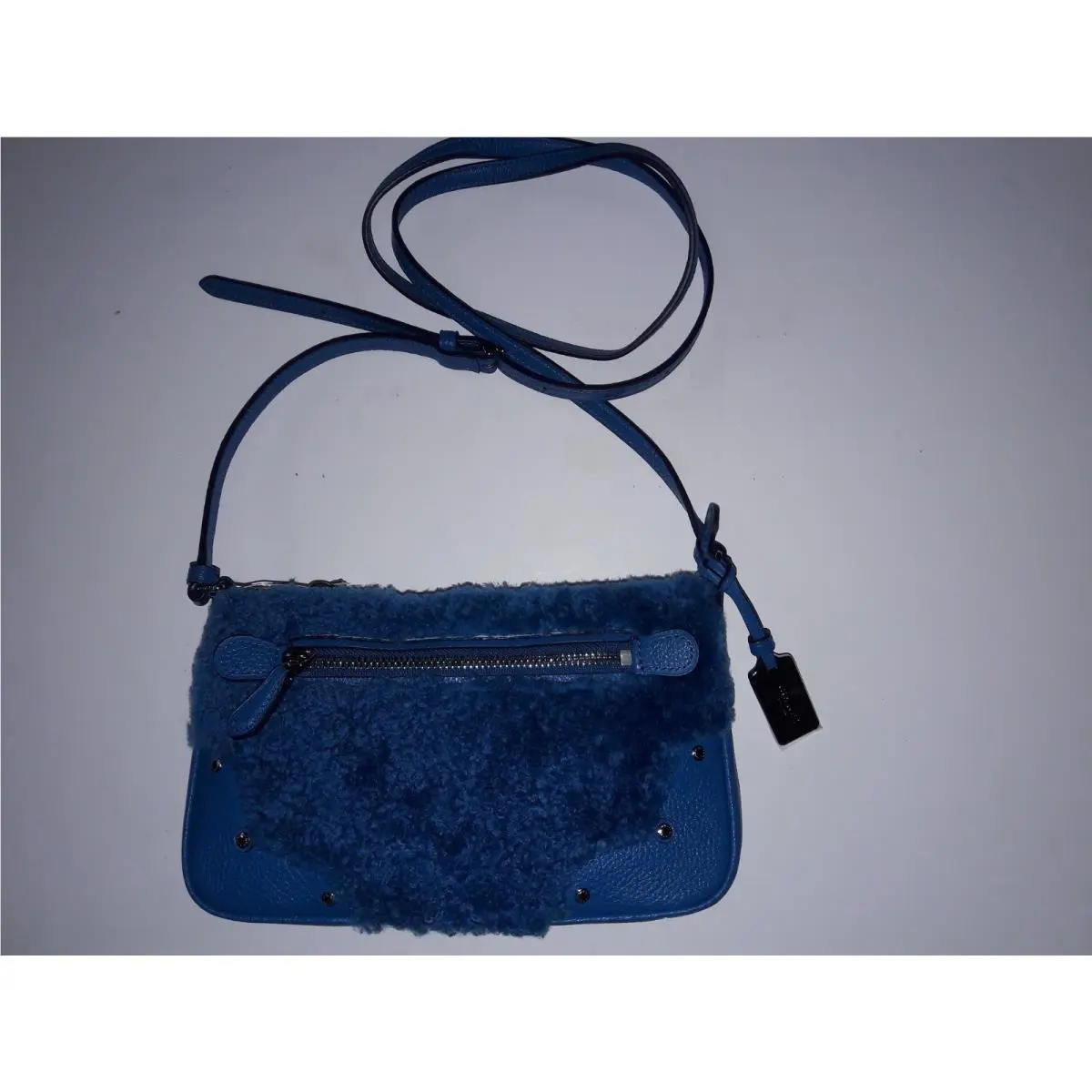 Coach 36490 Shearling Leather Rhyder Pochette Crossbody Purse Peacock