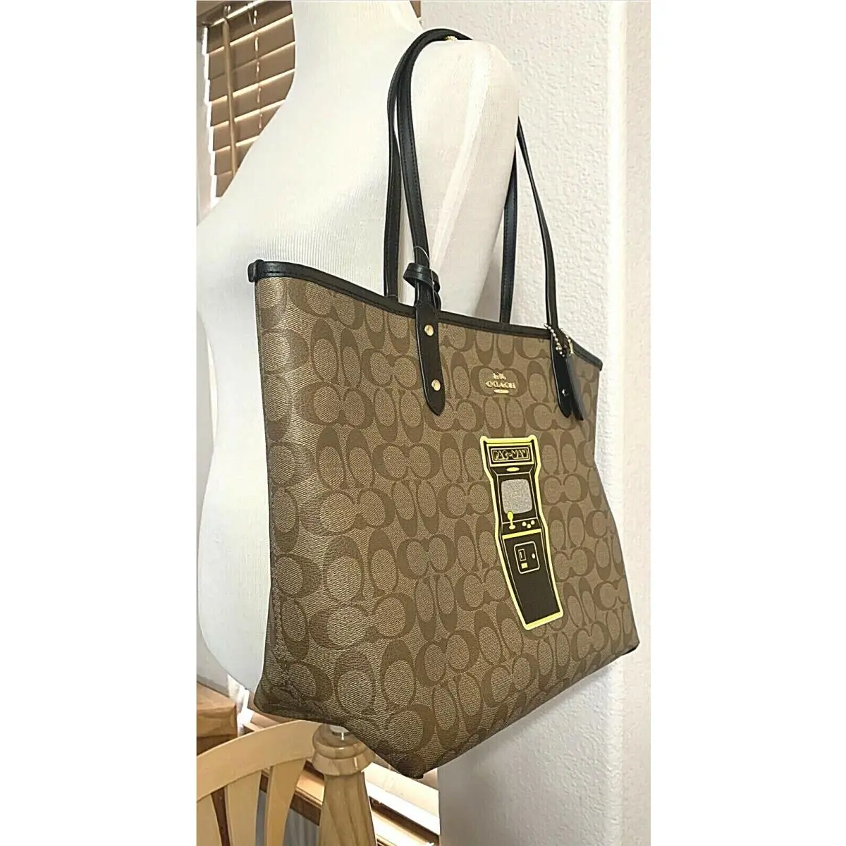 x Pac-man Reversible City Tote In Signature Canvas F72899 by Coach