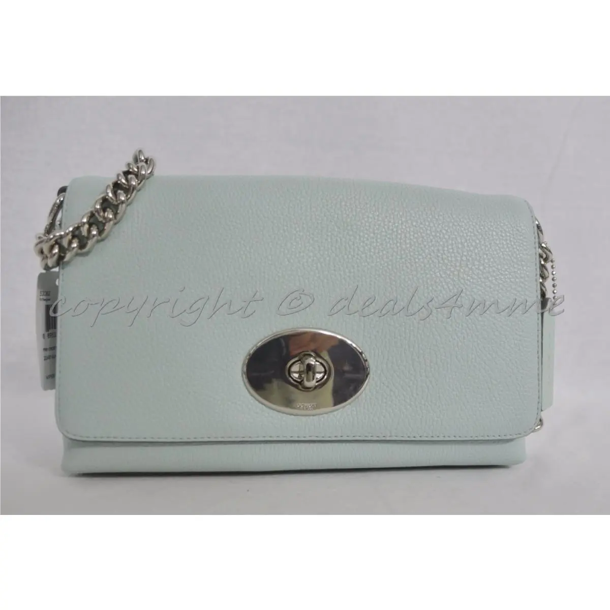 Coach 53083 Crosstown Crossbody In Pebble Leather in Seaglass. Light Green