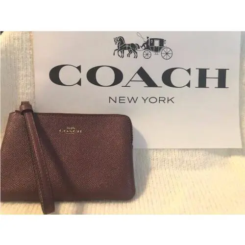 Beautiful Coach Womens Corner Zip Wristlet Bag in Vintage Mauve 58032