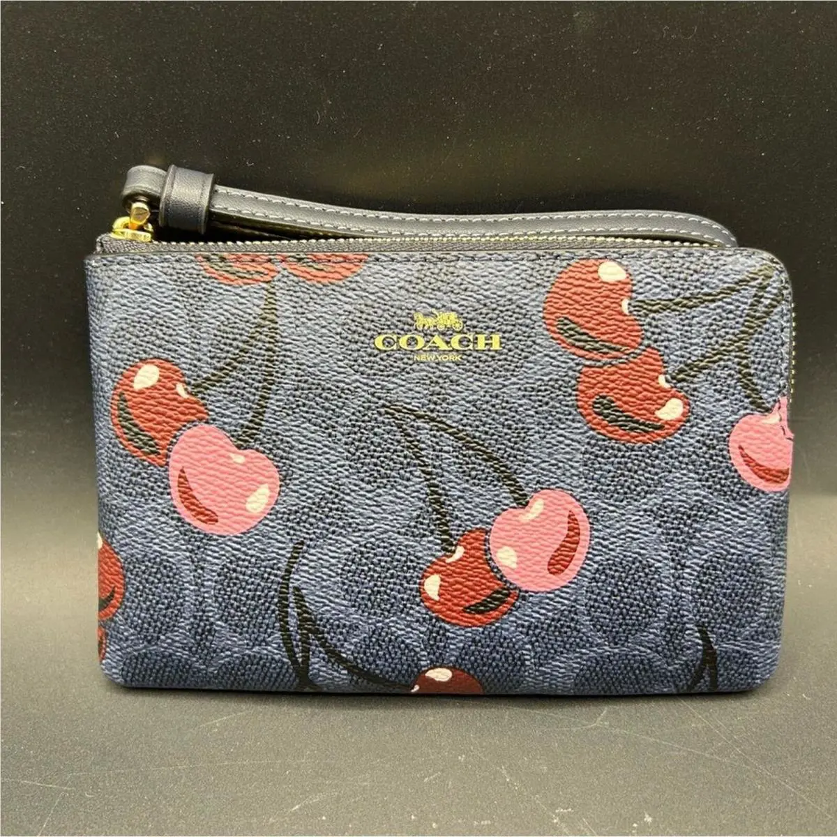 Coach Blue Wristlet with Pink Cherry Print