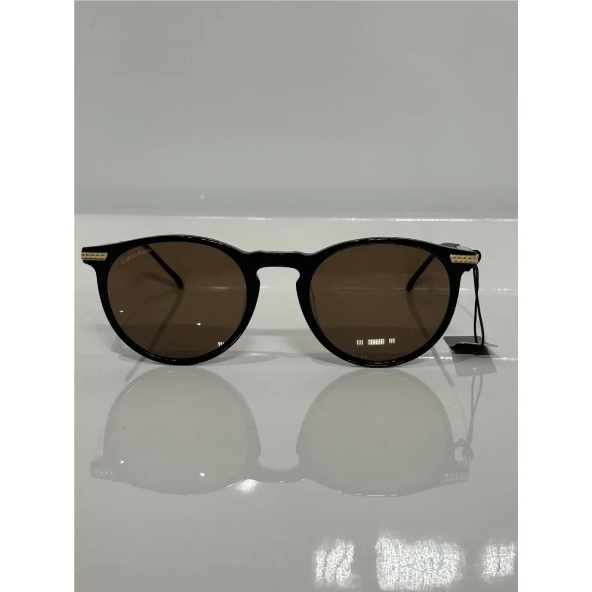 Calvin Klein CK22528TS 001 Black Round Acetate Titanium Sunglasses 51mm