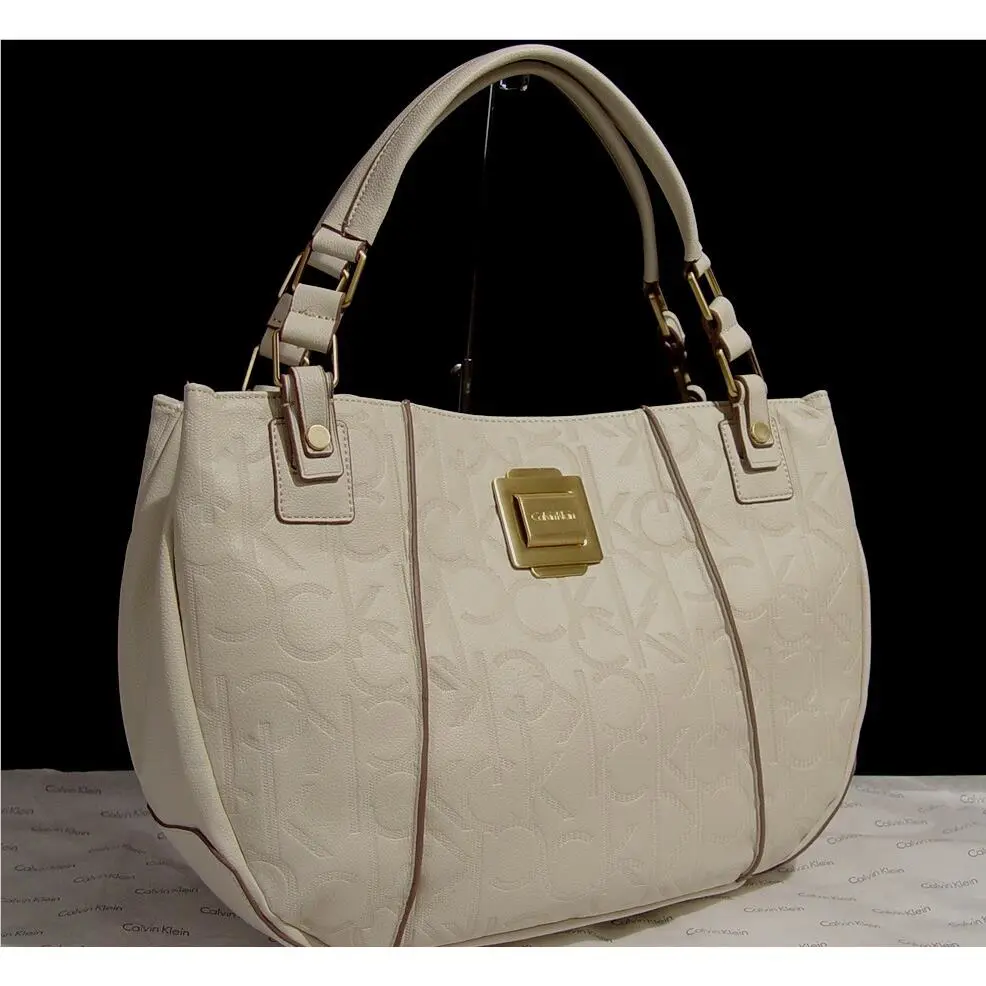 Calvin Klein Women`s White Logo Debossed Large Round Tote Bag Handbag Purse
