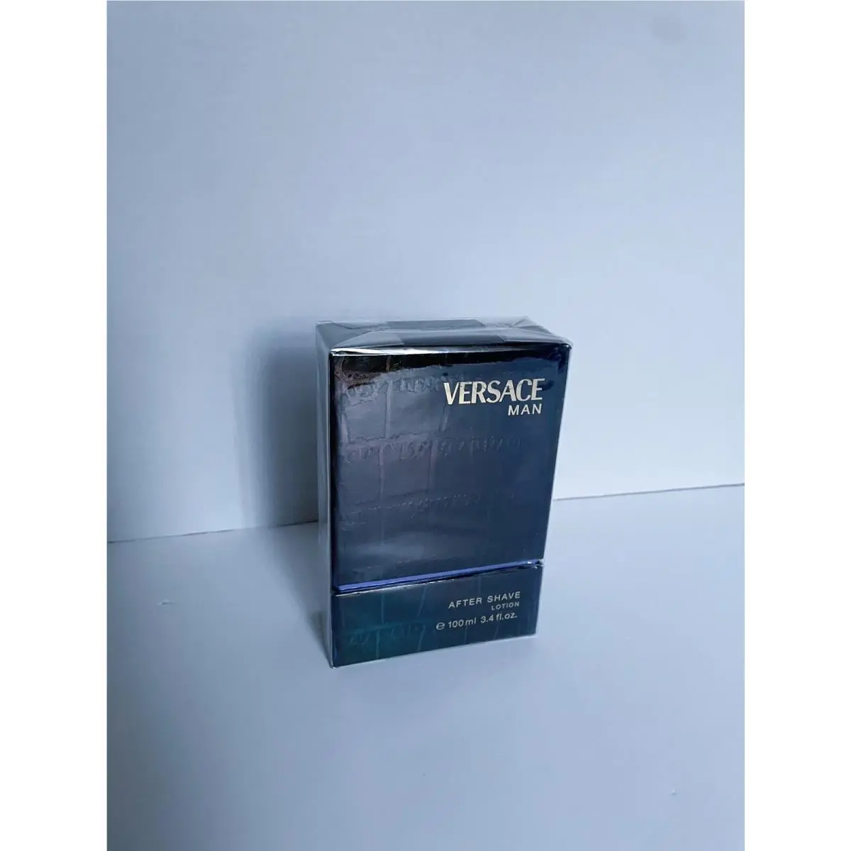 Versace Man by Versace 100 ml/3.4 oz After Shave Lotion/splash On