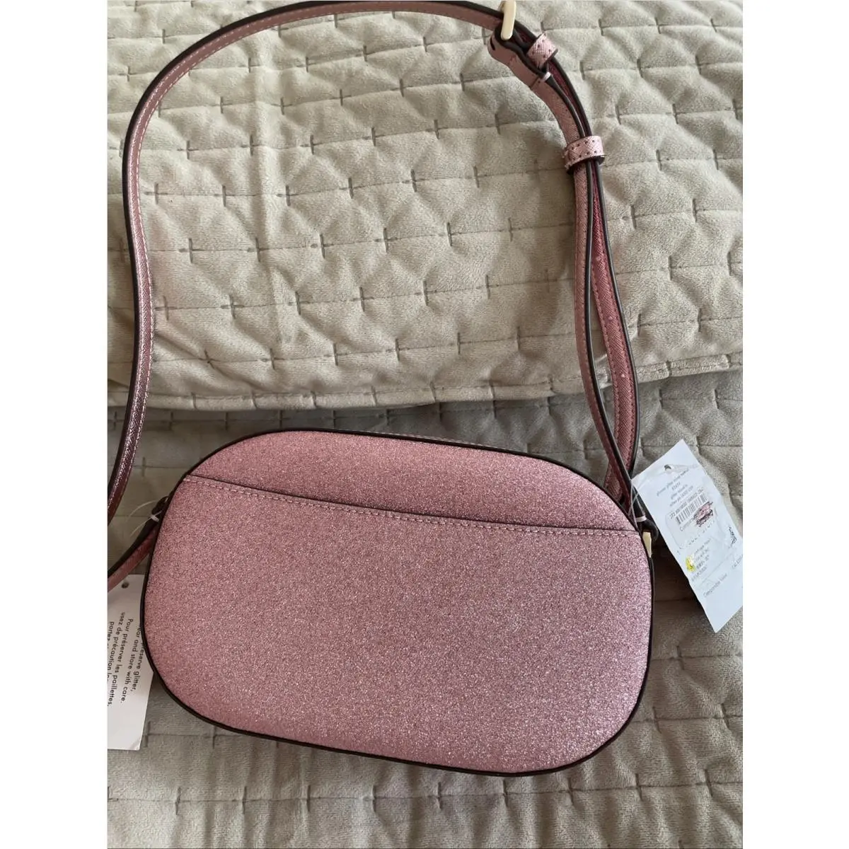KE459 Glimmer Glitter Oval Camera Crossbody Bag In Mitten Pink by Kate Spade
