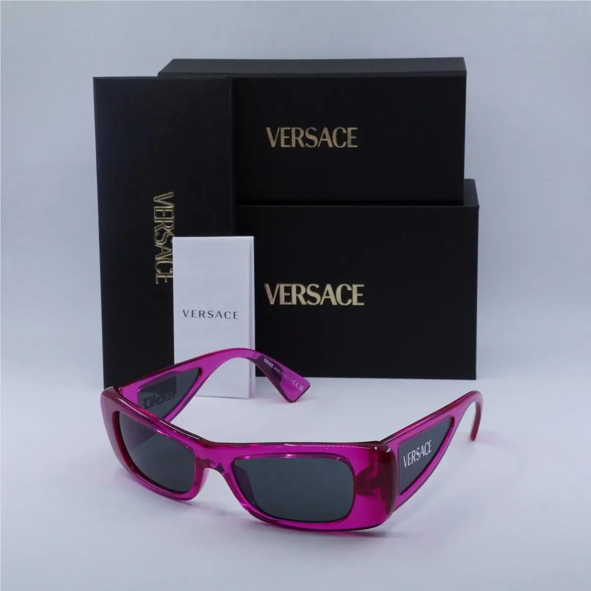 Versace VE4481 543487 Transparent Fluo Fucsia/dark Grey 54-17-135 Sunglasses