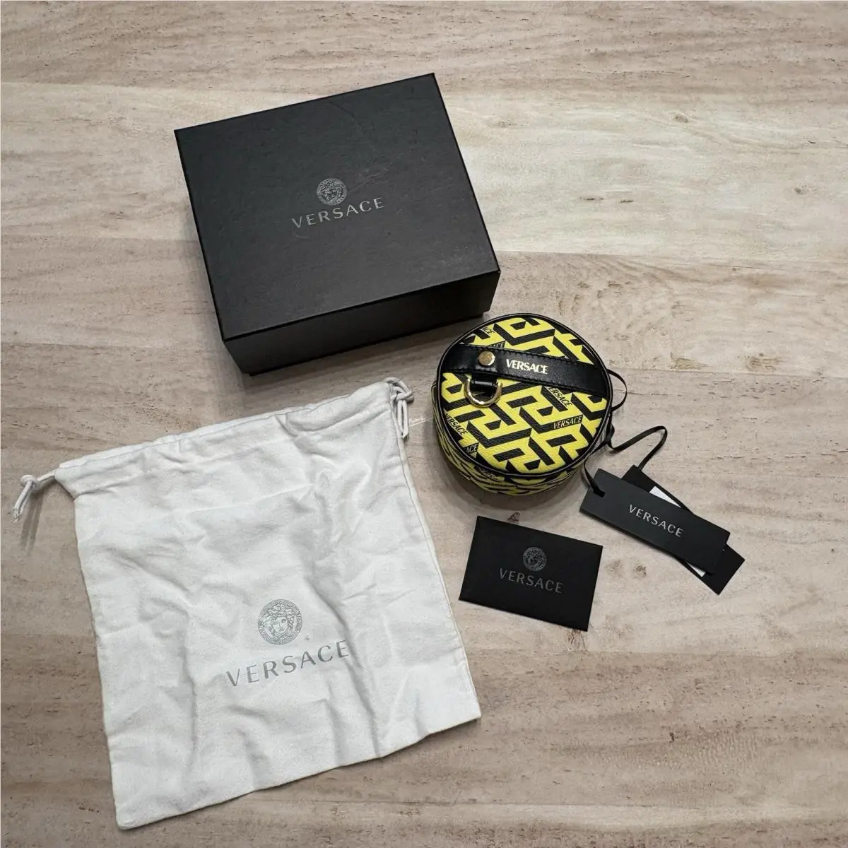 Versace Coated Canvas La Greca Round Zippered Wallet Pouch