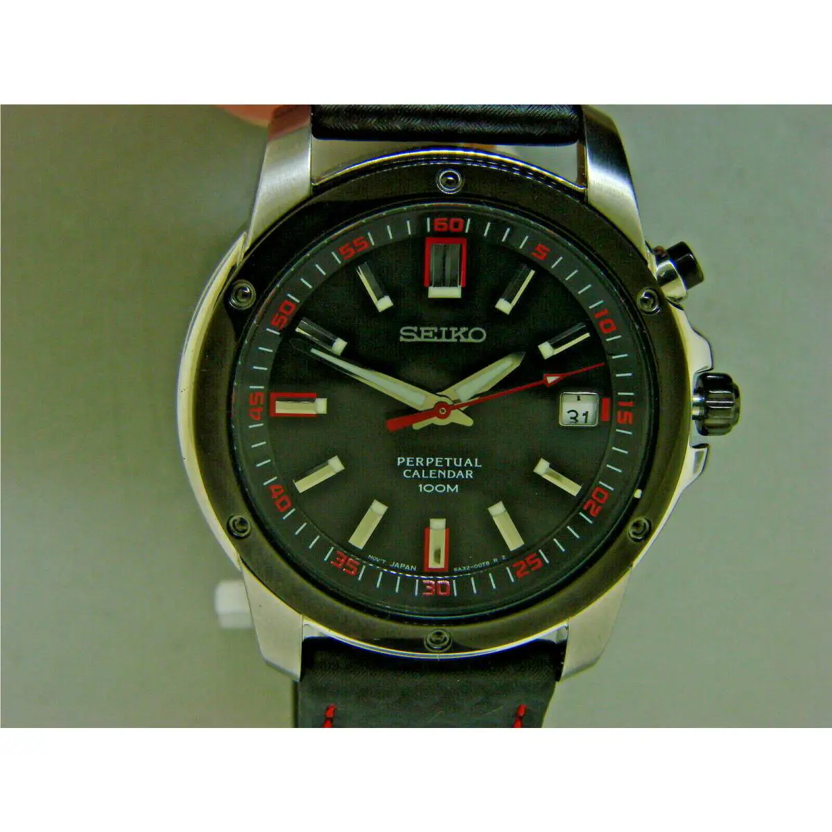 Seiko Men`s SNQ097 Perpetual Calendar Watch Black Ion Finish Black Bezel