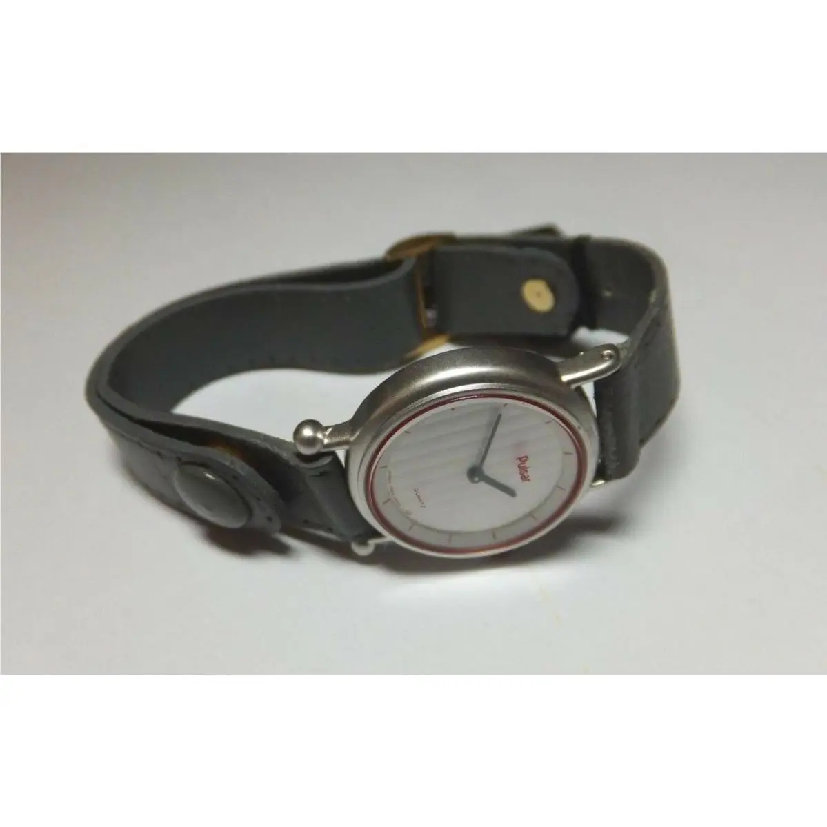 Nos 1980`s Pulsar by Seiko Fashion Quartz Ladies Gray Leather Watch Ref. PED267S