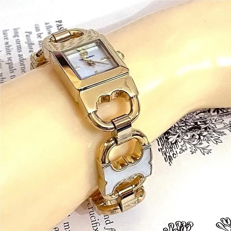 Tory Burch TBW5409 Gemini Gold Plated White Pearl Women’s Bracelet Watch