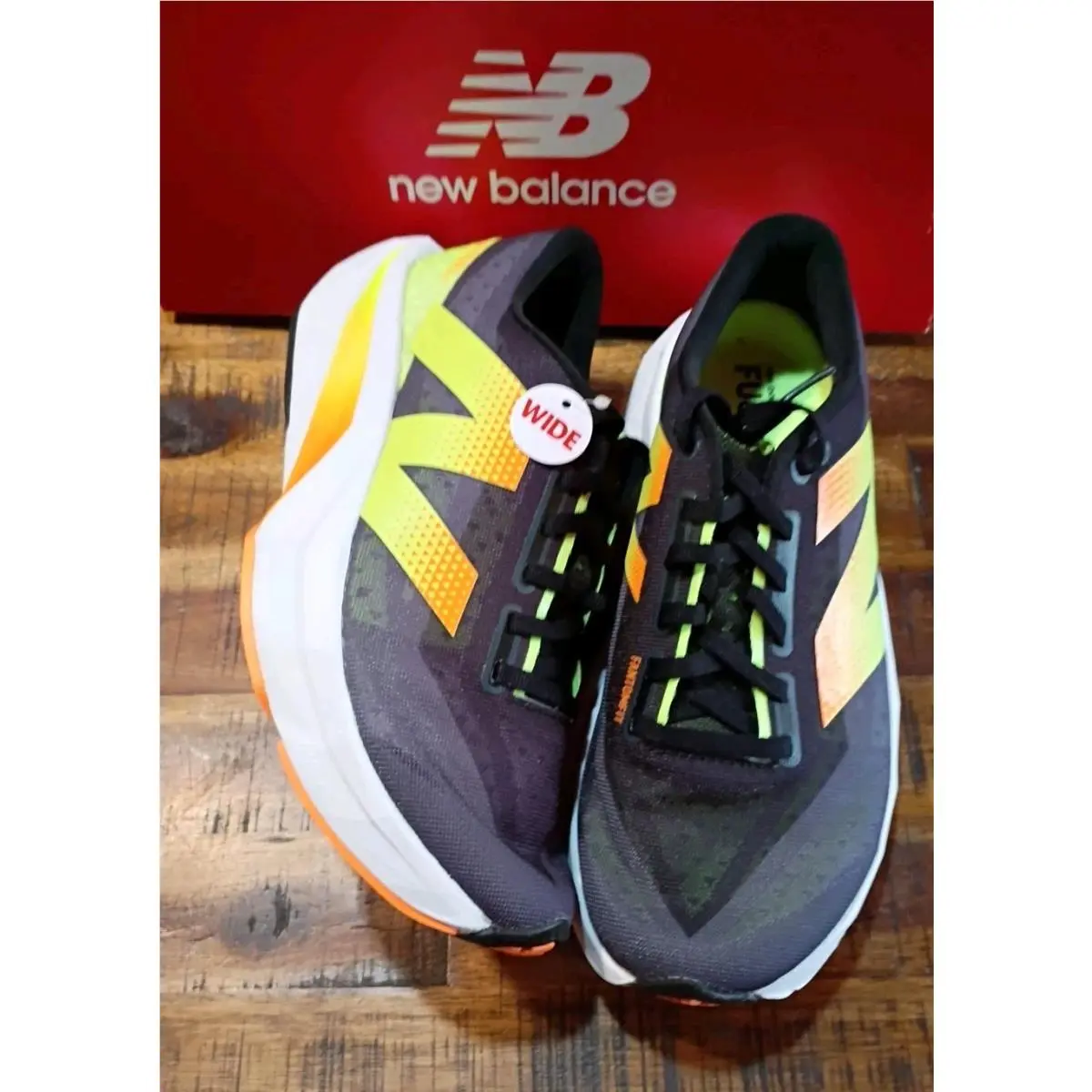 New Balance shoes - New Balance FuelCell Rebel - FuelCell Rebel - WFCXCG4 - black yellow orange 0