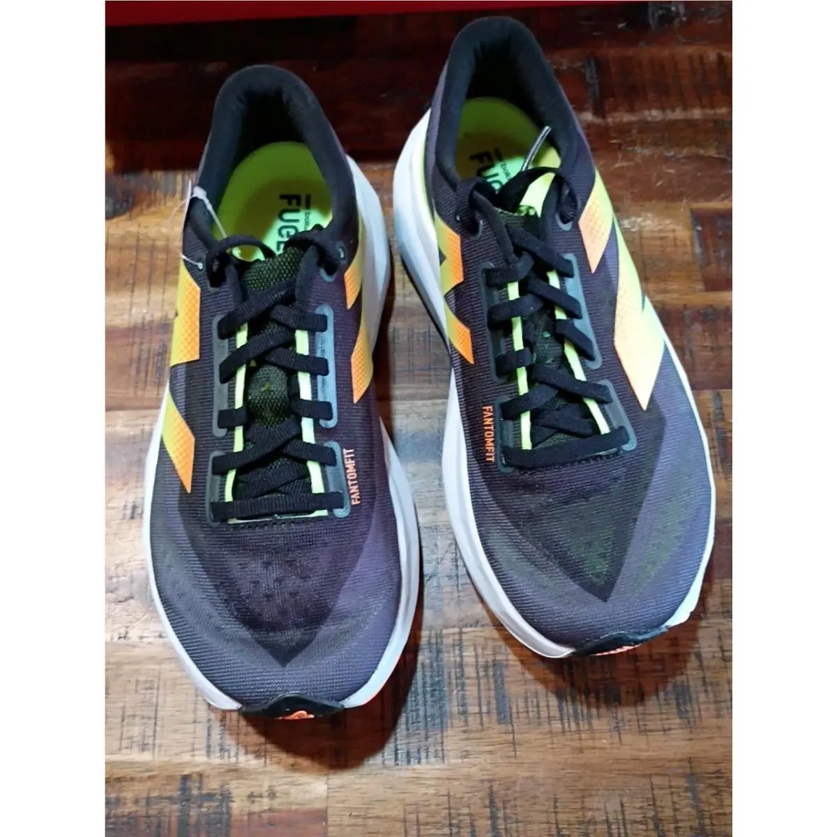 New Balance shoes - New Balance FuelCell Rebel - FuelCell Rebel - WFCXCG4 - black yellow orange 0