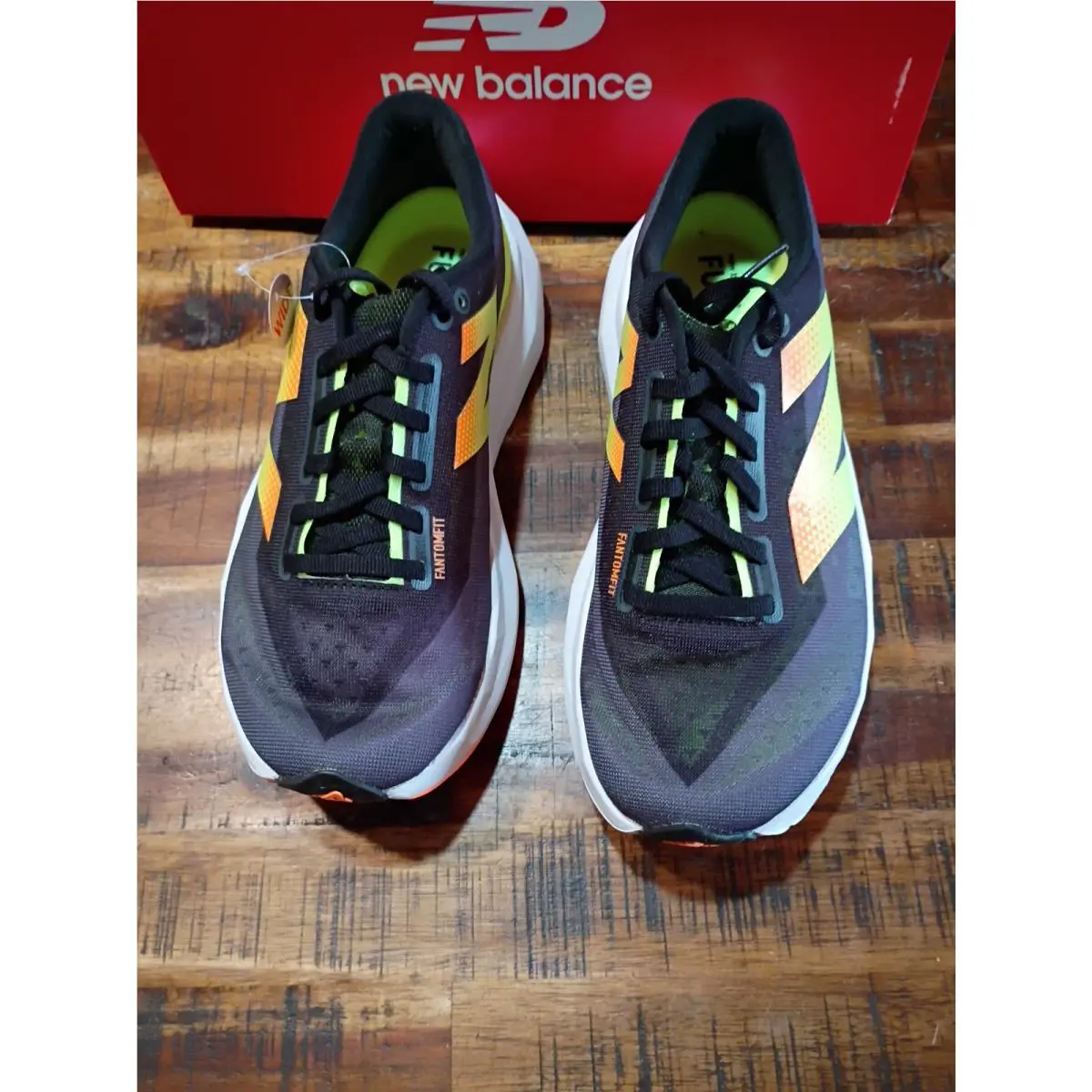 New Balance shoes - New Balance FuelCell Rebel - FuelCell Rebel - WFCXCG4 - black yellow orange 1