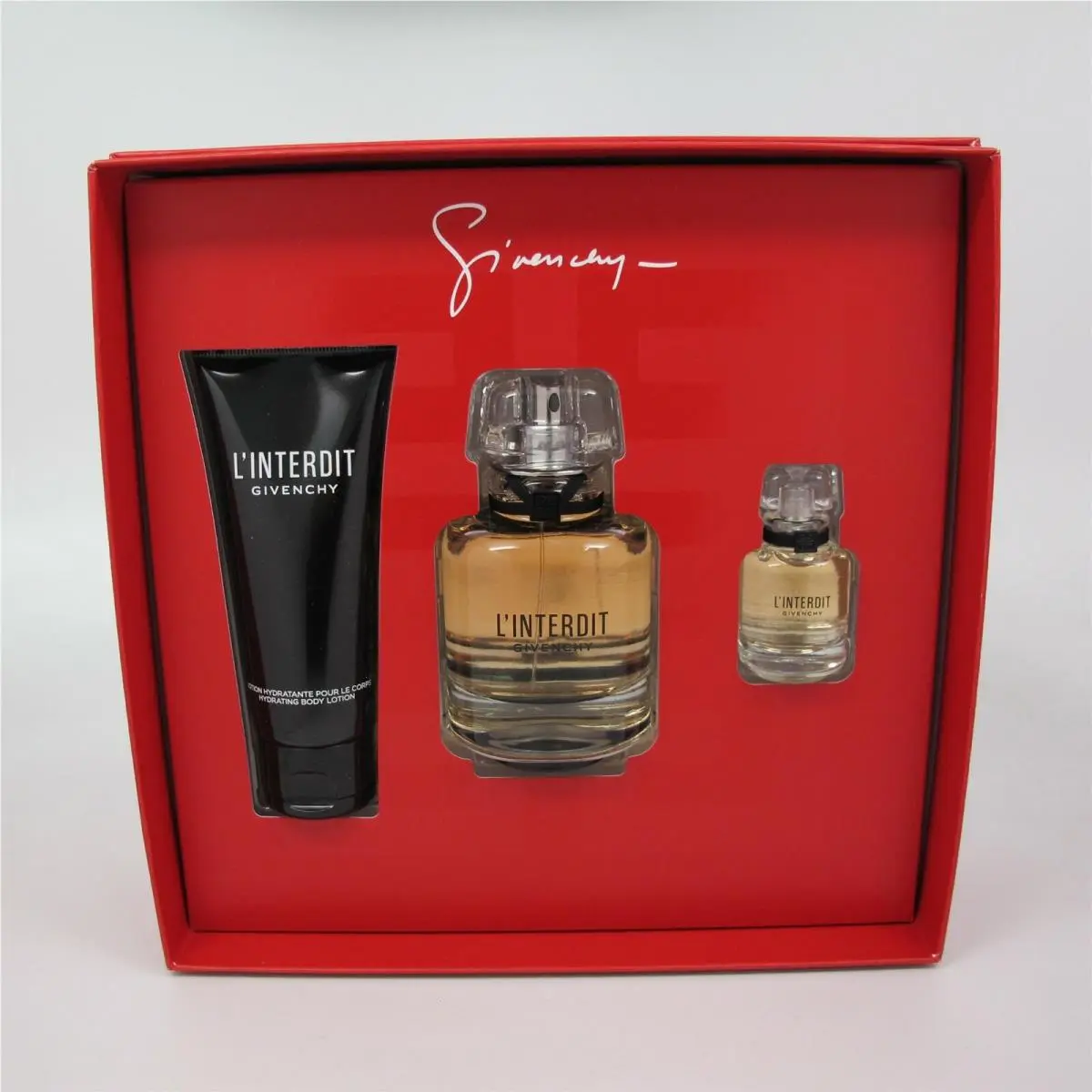 L`interdit by Givenchy 3 Pc Set: 2.6 oz Edp Spray 0.3 oz Mini 2.5 oz Lotion