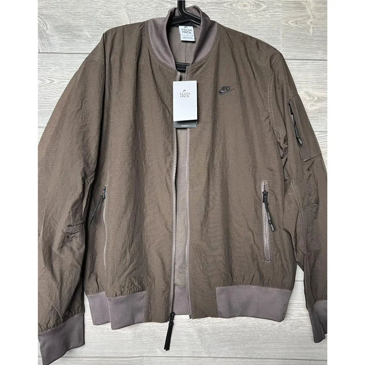 Nike clothing - SPORTSWEAR TECH PACK MEN`S WOVEN LINED BOMBER JACKET - DM6940-004 - Brown 0