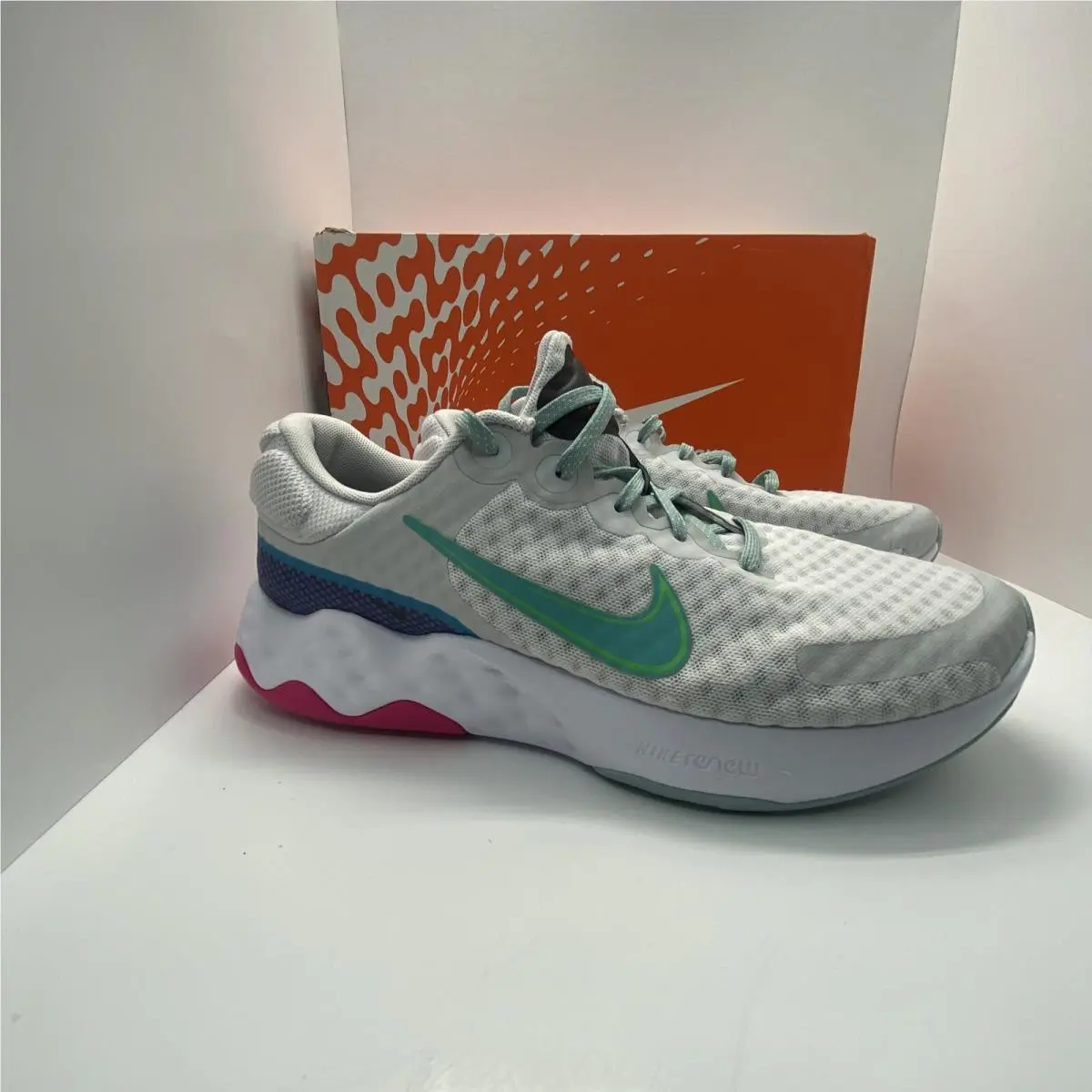 Women`s  DC8184 006  Renew Ride 3 Running Photon Dust Shoes Sneakers by Nike