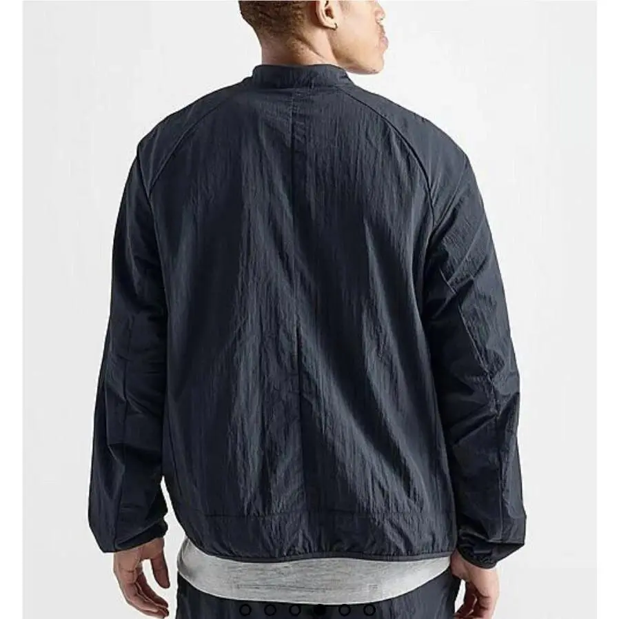 Nike clothing - Nike Tech Woven Cargo Jacket - FZ0750-010 - Black (UPC: 0197597301662) 0