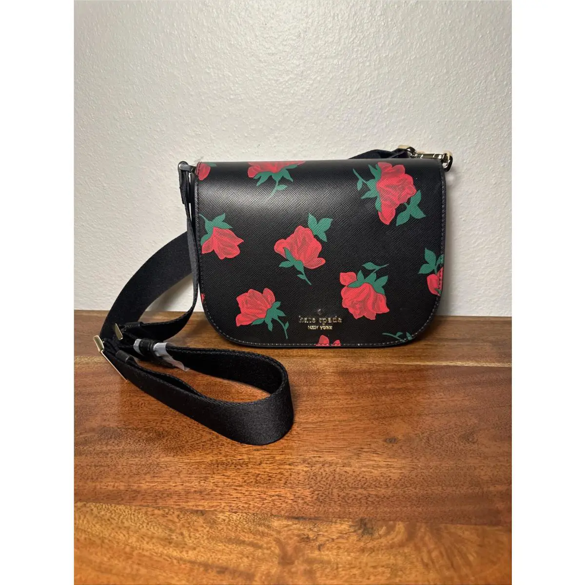 Kate Spade New York Madison Red Rose Toss Printed Saddle Crossbody Bag Black