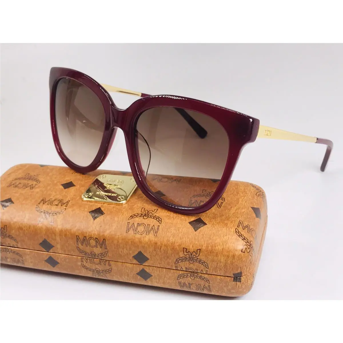 MCM628SA 603 Bordeaux Gold Sunglasses 55mm with Mcm Case