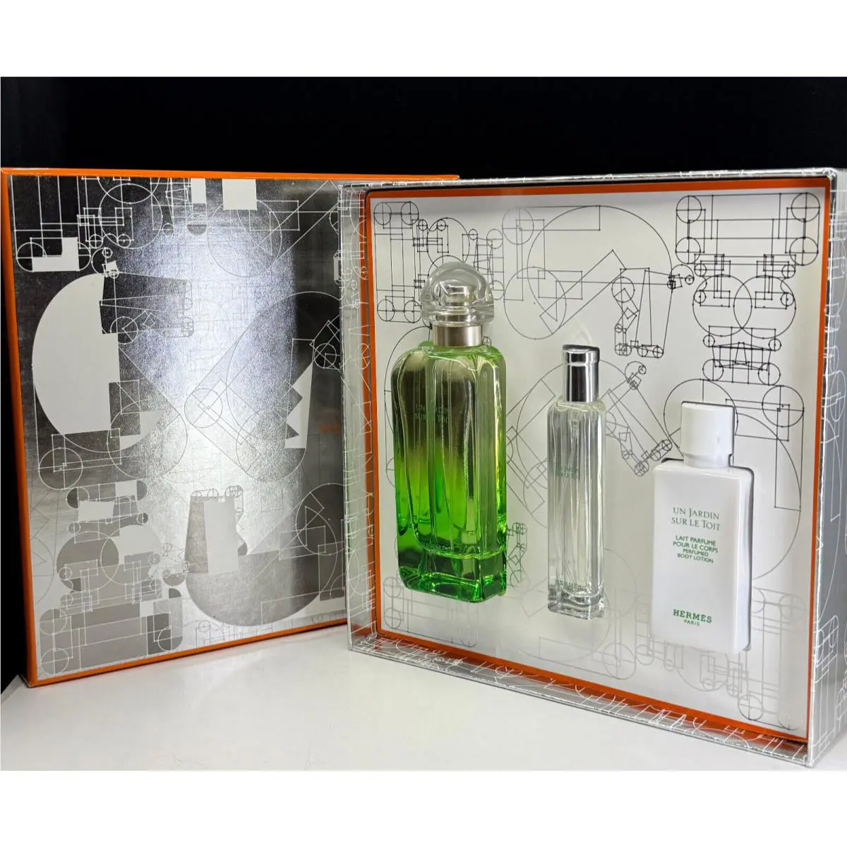 Un Jardin Sur Le Toit by Hermes 3 Pcs Edt- 3.3oz+0.50oz+1.35oz Body Lotion
