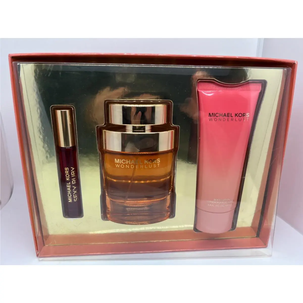 Michael Kors Wonderlust 3 Piece SET:3.4 Edp Spray 10 ML Edp Roll On 3.4 Lotion