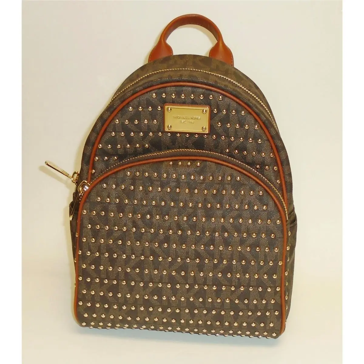 Michael Kors Jet Set Item Brown Pvc Monogram Small Studded Zip Backpack Bag