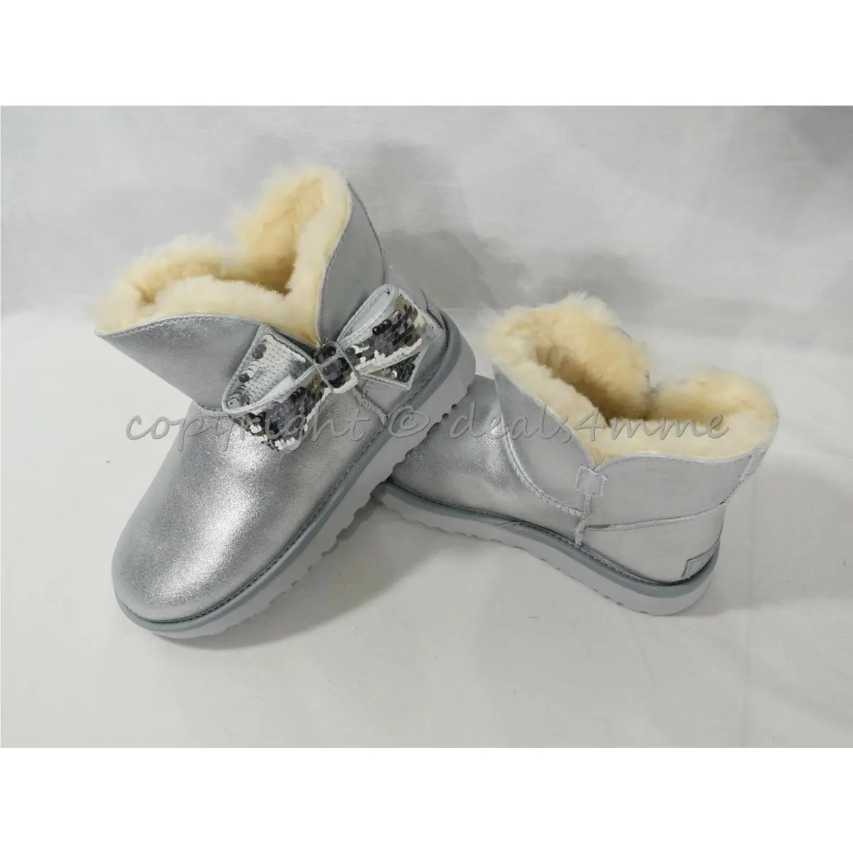 Ugg Mini Sequin Bow Booties in Silver. US Women`s Sizes 7M