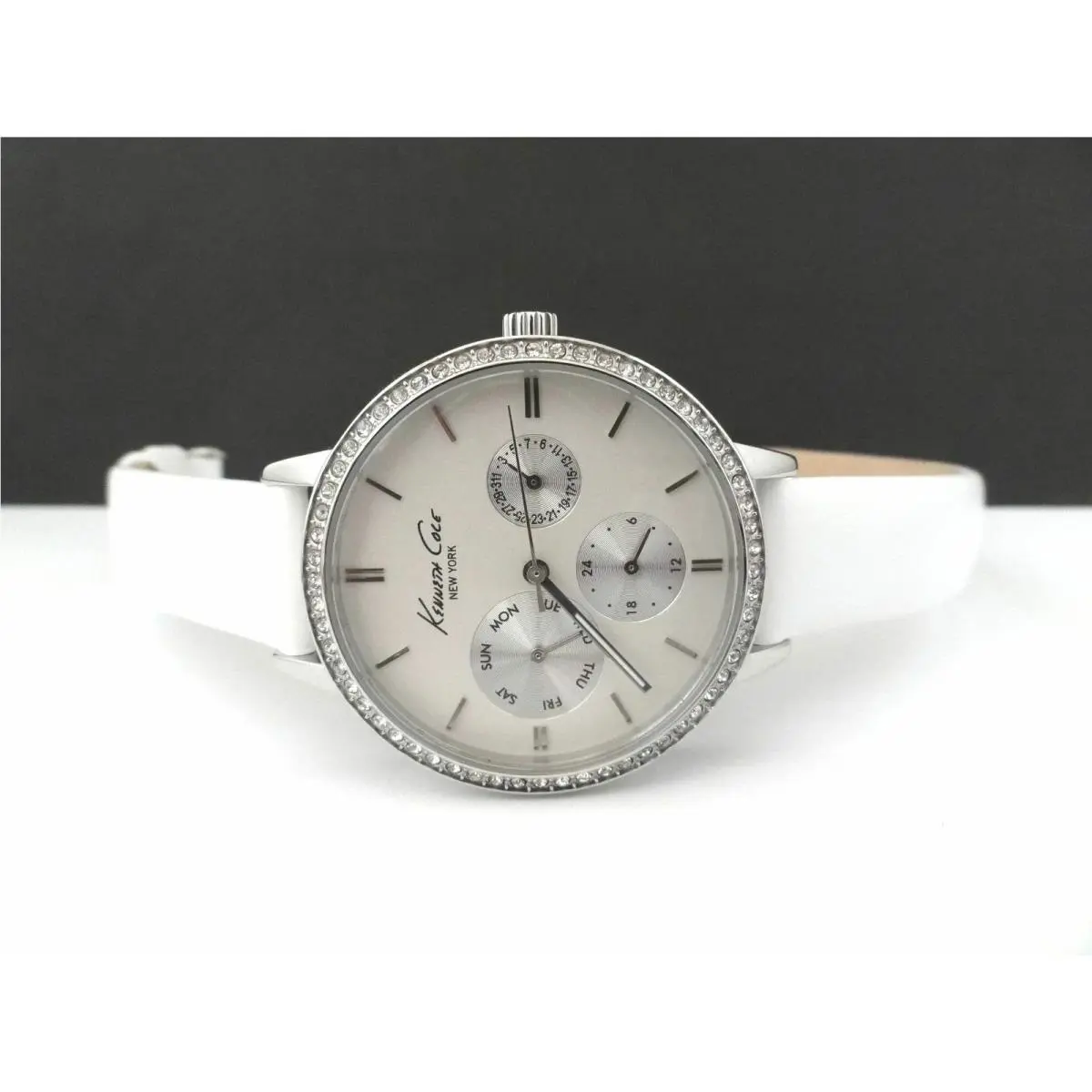 Kenneth Cole KC2547 White Leather Strap Crystal Embellished Bezel Women`s Watch