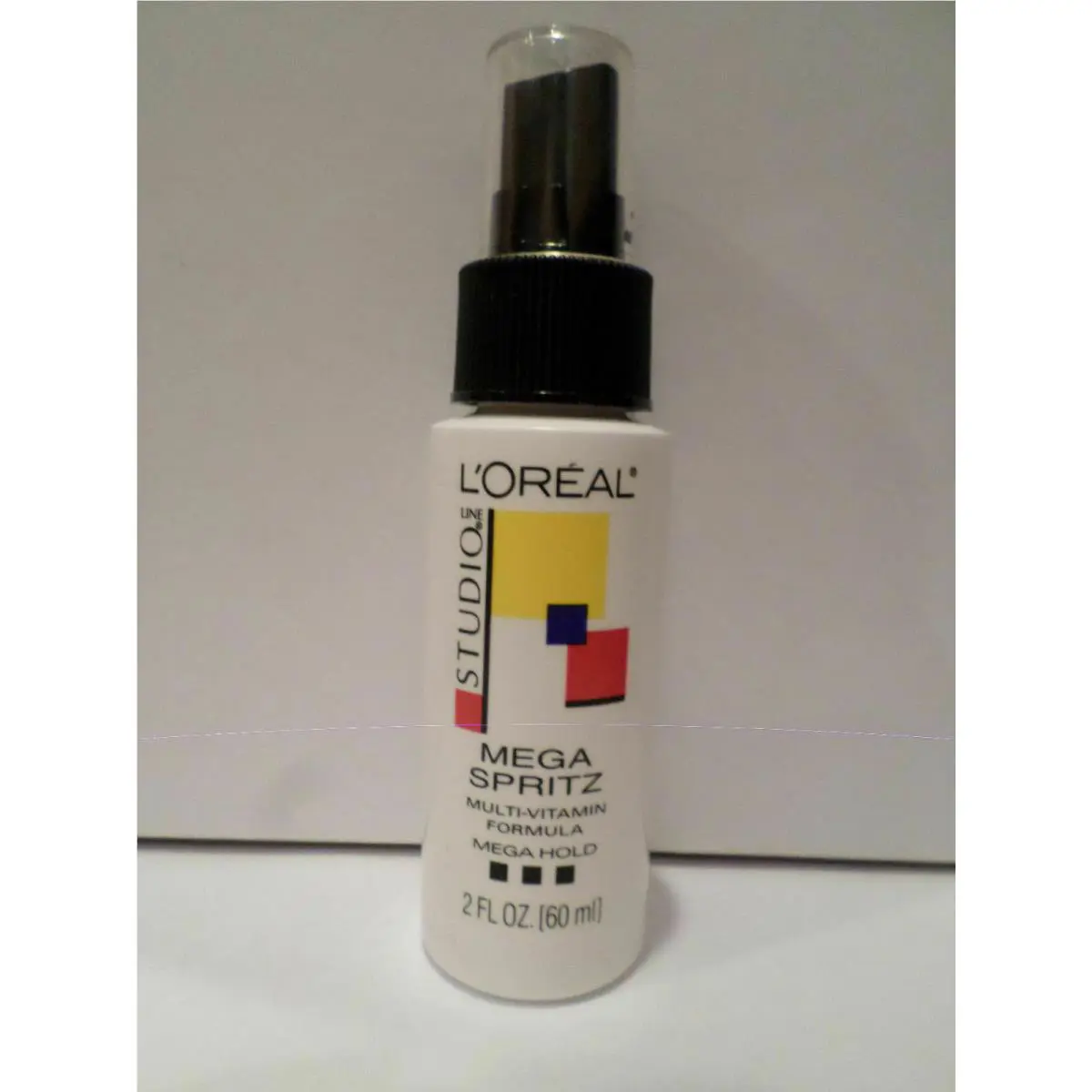 L`oreal Mega Spritz Studio Line Multi Vitamin Formula Mega Hold 2oz Travel Size