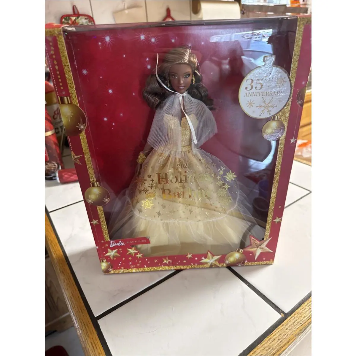 Barbie 2023 Holiday Signature Seasonal Collector Gift Doll Dark Brown Hair Gold