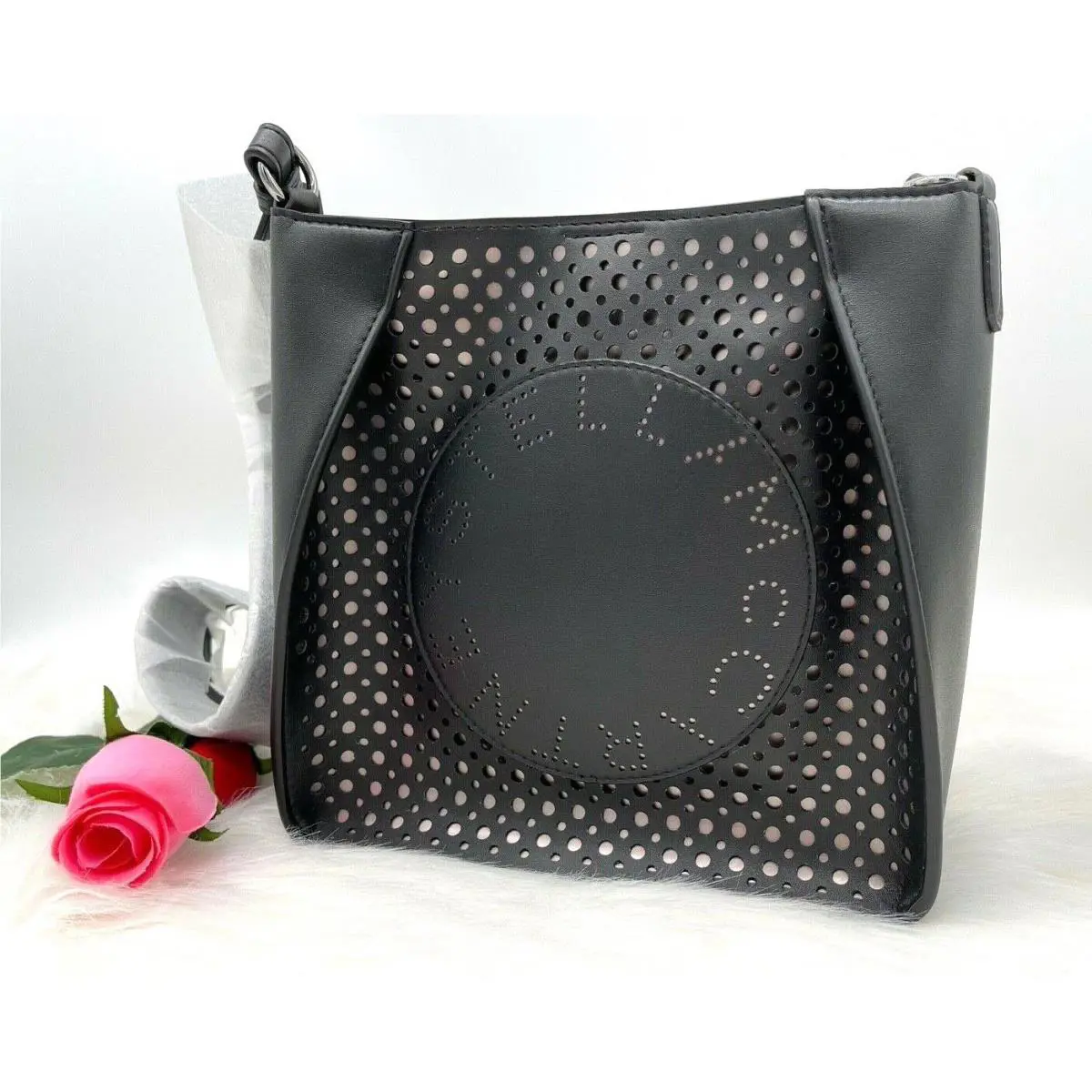 Stella Mccartney Laser Cut Logo Alter Napa Crossbody Bag In Black by Stella McCartney