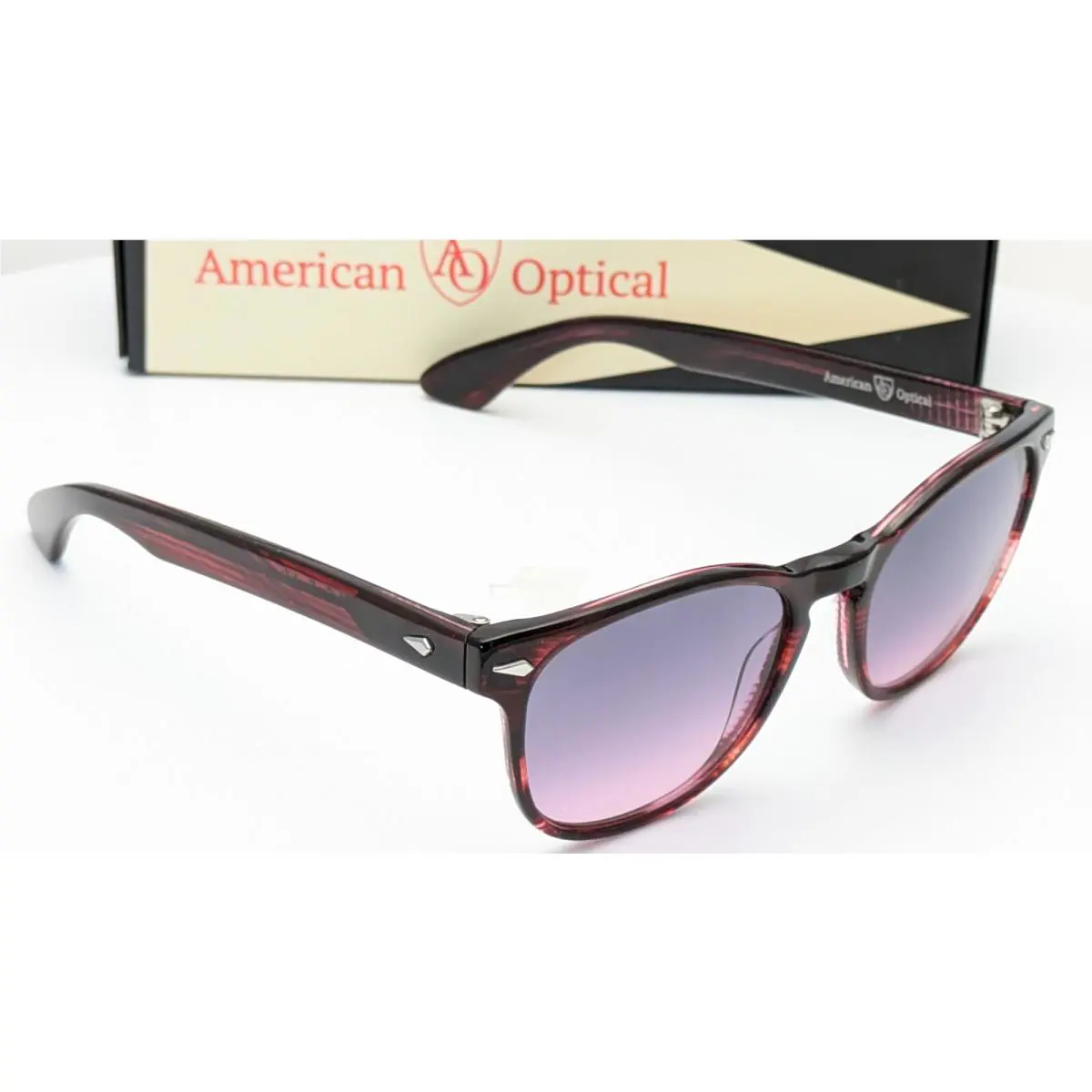 American Optical AO1004 Oval Cardinal Gray Gradient Womens Sunglasses 51mm