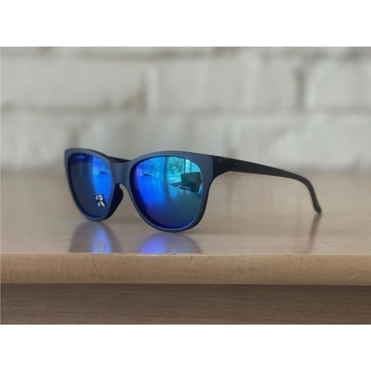 Oakley Hold Out OO9357-0655 55:17 Steel Frame Sapphire Iridium Polarized Lens