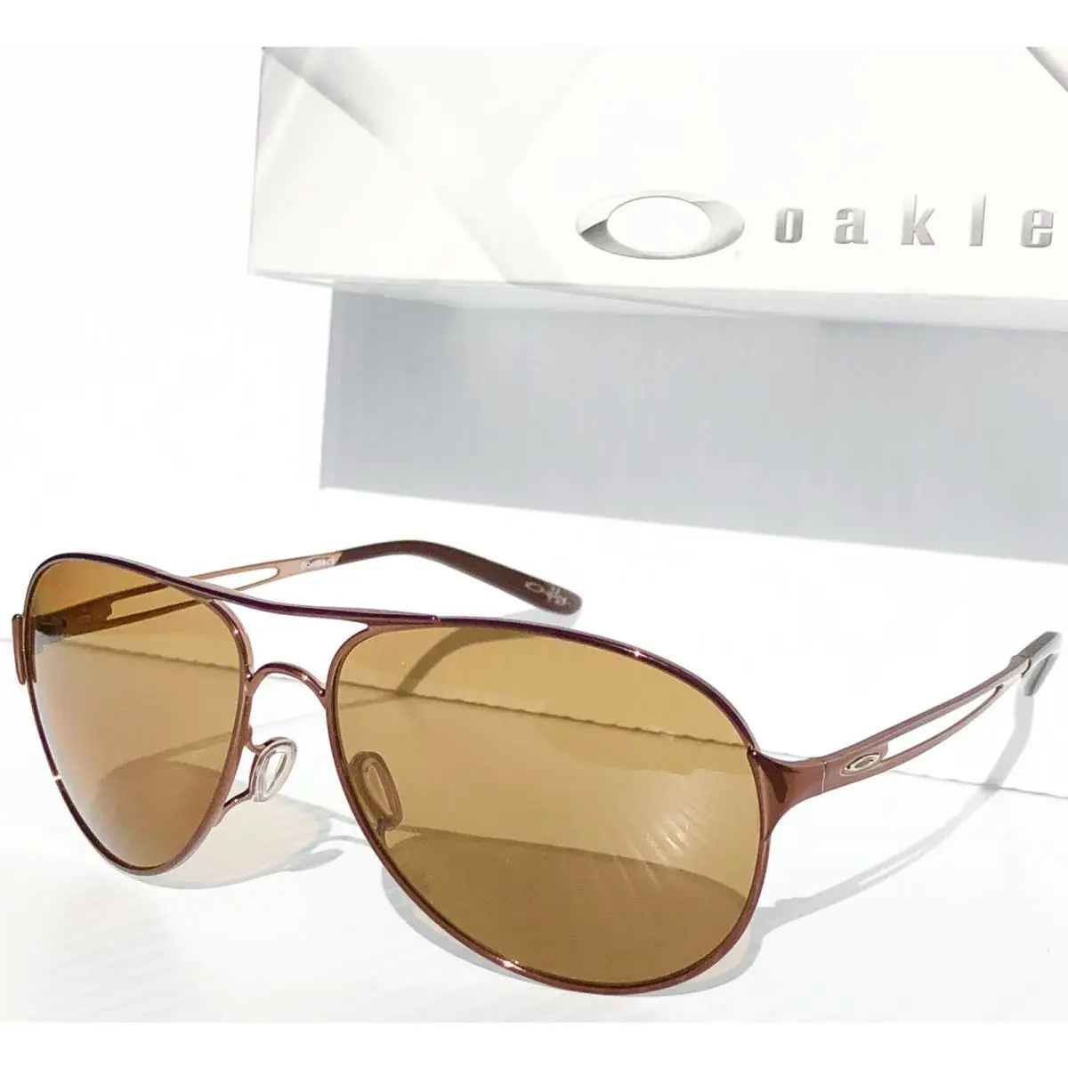 Caveat Brunette Polarized Bronze Lens Womens Sunglass 4054-05 by Oakley