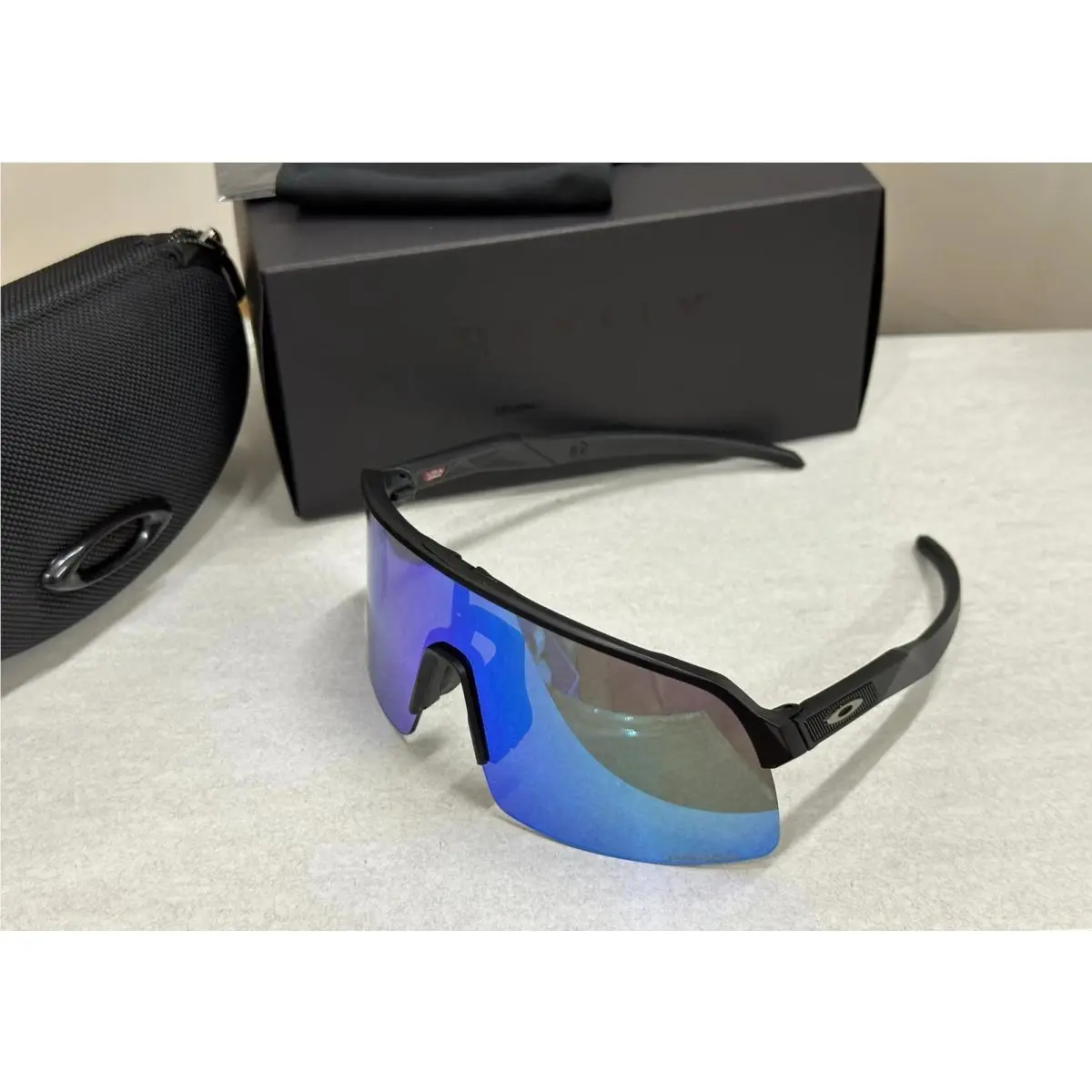 Oakley Sutro Lite Sunglasses OO9463 - Frame: Black, Lens: Blue