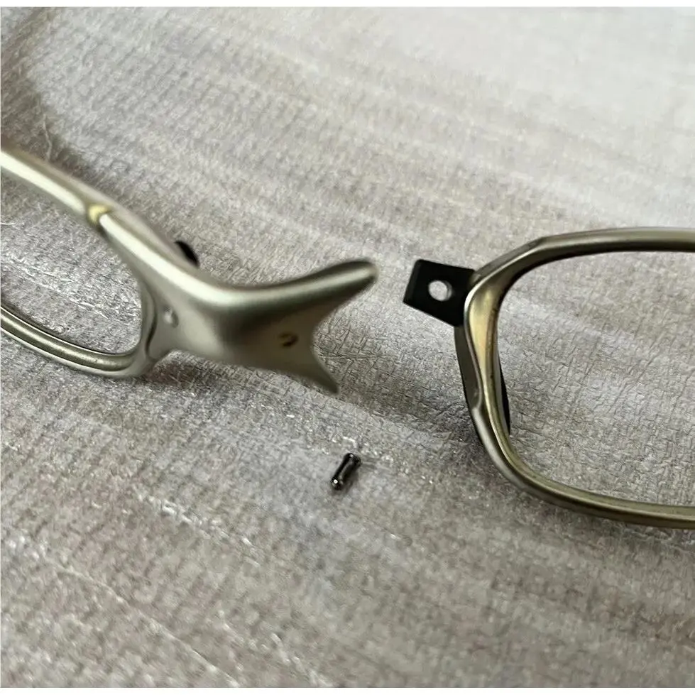 X Metal Nose Bridge Repair Tune up Service by Oakley